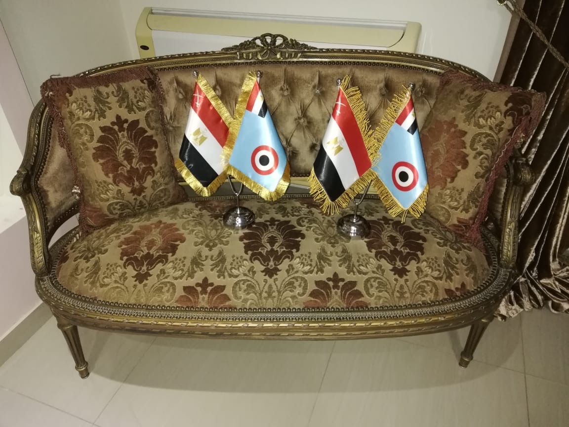 Egyptian flag pairs displayed in palace salon